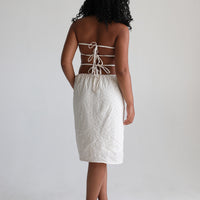 Model showing the back of the dress.